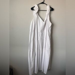 Plus size white maxis dress with pockets